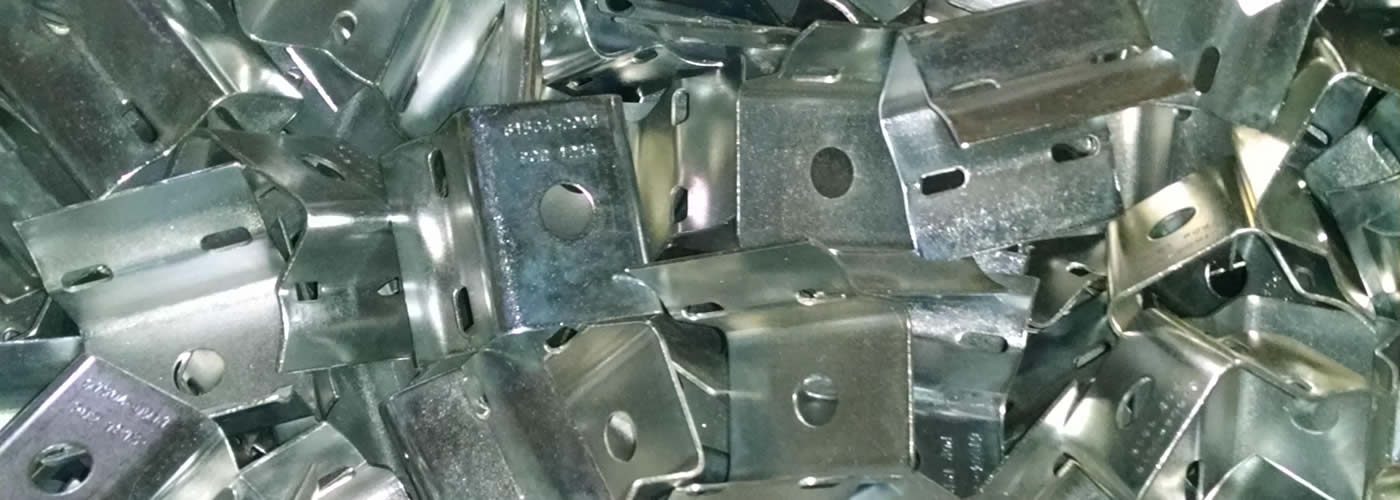 Clear zinc plated stampings finished at Parker Metal Finishing